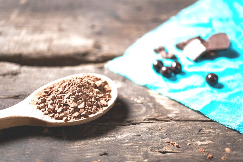 Finished chocolate pieces and cocoa powder, the kind of moments premium cocoa powder creates